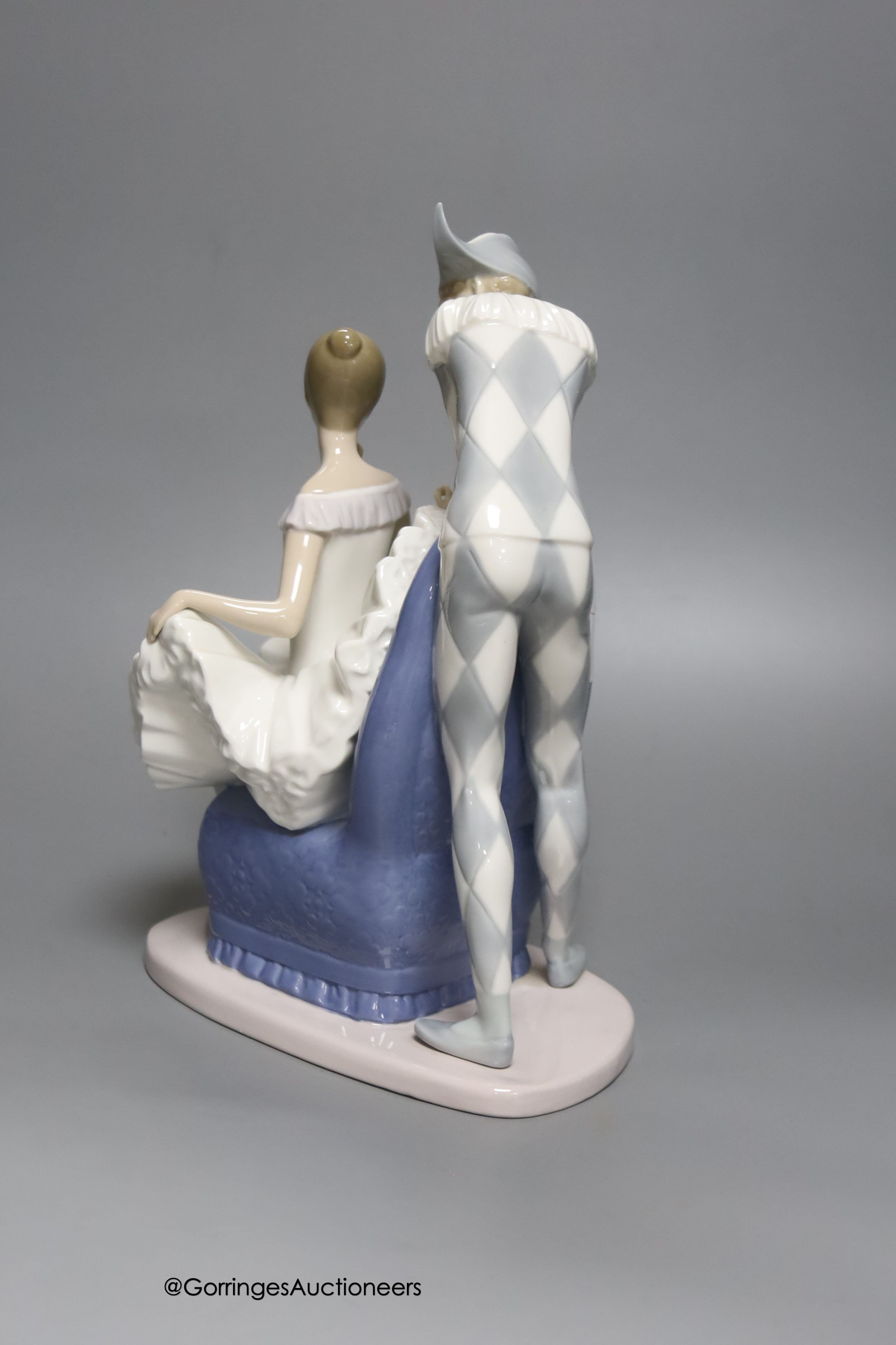 A large Nao by Lladro porcelain figure group 'A Dream Come True', height 30cm